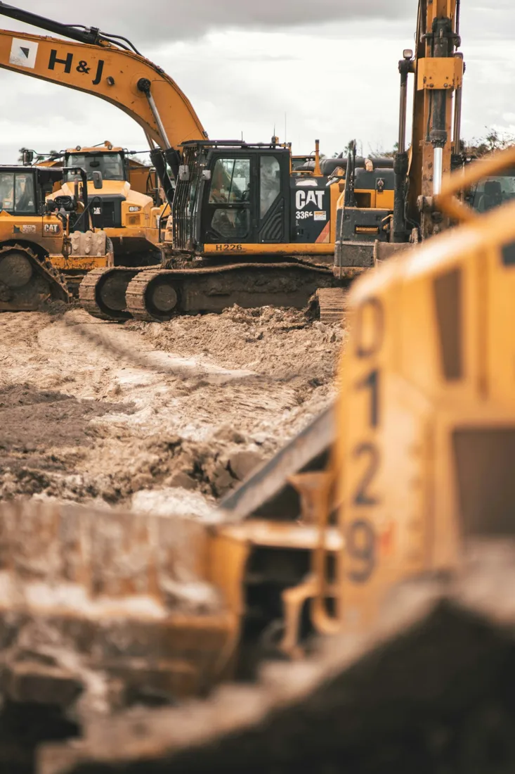Construction machinery at a dirt worksite
